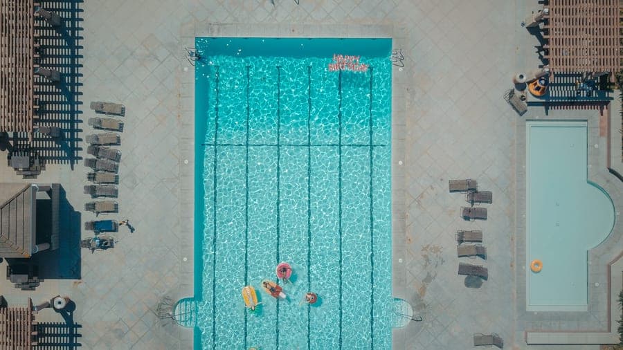A swimming pool on a bright summer afternoon